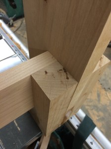 How the headboard stile fits into the foot and side rail.